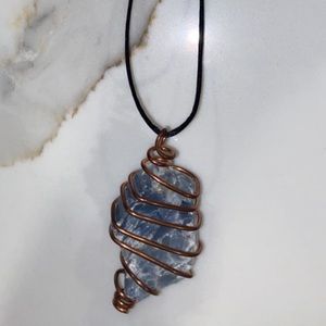 Blue calcite crystal with copper necklace